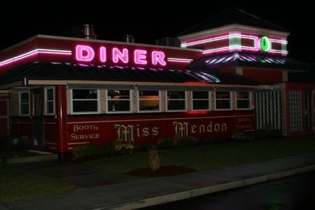 miss-mendon-at-night-with-neon-glowing.jpg